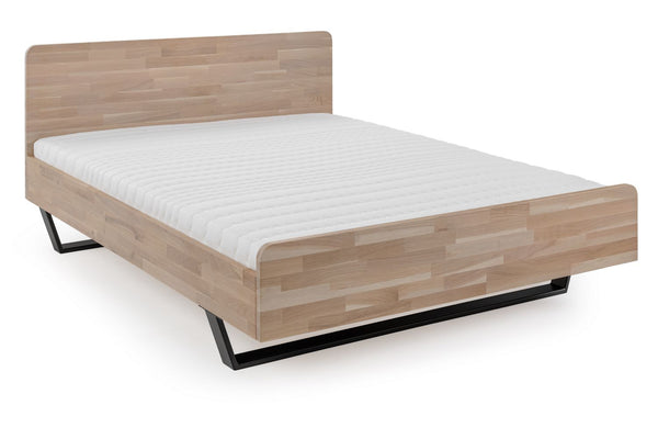 Łóżko dębowe Tammi z płozami